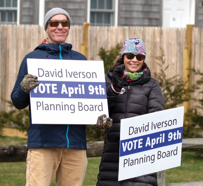 Planning Board winner David Iverson and his wife Tara campaign along Surfside Road Tuesday.