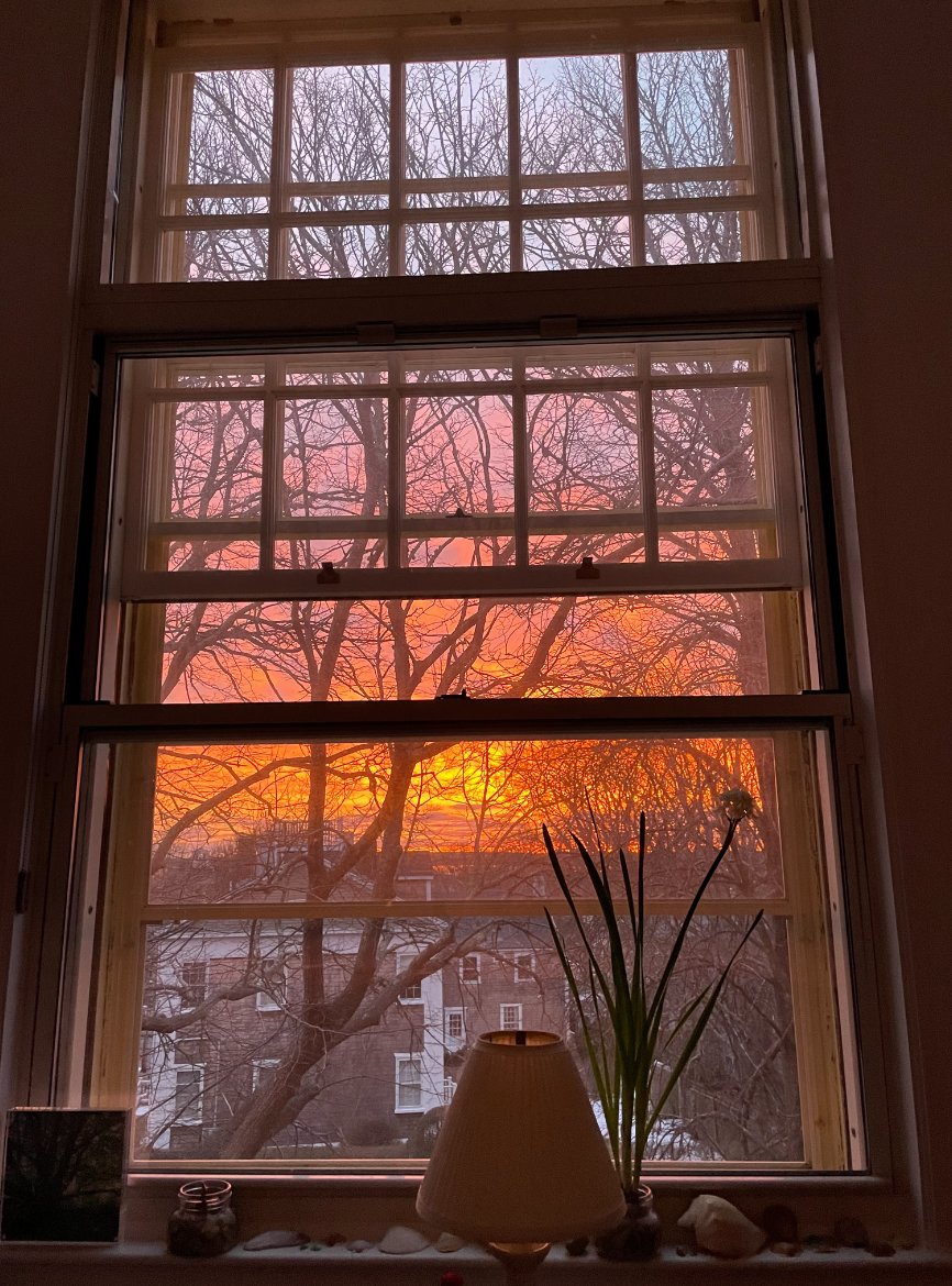 The sun rises over downtown Nantucket Feb. 22, as seen through a window at Academy Hill apartments.