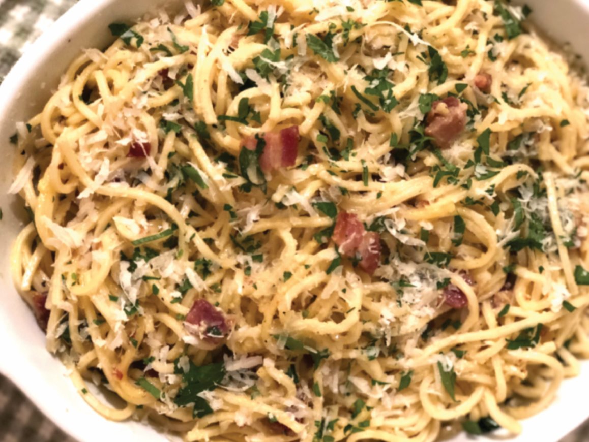 A favorite dinner after shopping for Italian specialties on Federal Hill in Providence, R.I. is Spaghetti alla Carbonara, made with guanciale and plenty of freshly-grated Parmigiano-Regianno and Pecorino Romano cheeses.