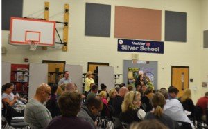 Parents speak during a meeting at Piney Branch to discuss redistricting upon opening of the new "Devlin Road" school. 
