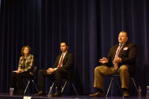 The three candidate, Jeanine Lawson (R), Eric Young (D) and Scott Jacobs (I) debate on stage. (Photo Credit: Mary Davidson, Potomac Local)