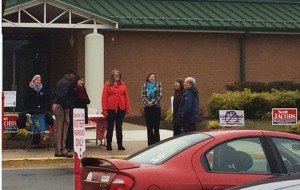 Republicans meet voters outside Buckland Mill Elementary School Tuesday. 