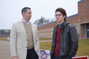 Democratic Candidate for Brentsville Supervisor, Eric Young, talks with first time voter Parker Anderson. 