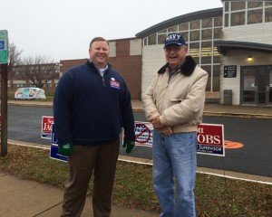 Independent Candidate Scott Jacobs laughs with Nokesville resident Gerry Sproles outside of polling place, Brentsville District High School. 