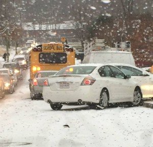 Prince William School bus involved in a car accident holds up drivers on Botts Avenue in Woodbridge, VA. (Photo submitted by Nicole Gonzales)