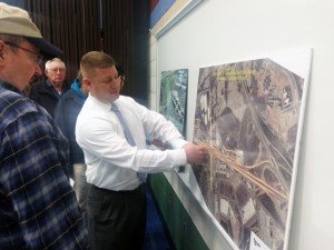 Steve Kuntz, design consultant with Dewberry, the firm who designed the Gainesville improvement project, explains details of the detour to a longtime Gainesville resident on Thursday, April 9 during a town hall meeting on the project.  Jamie Rogers, Bristow Beat 