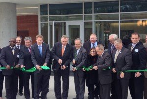 Governor McAuliffe, along with George Mason representatives and local officials cut the ribbon at the new Technology & Biomedical Research Center. 