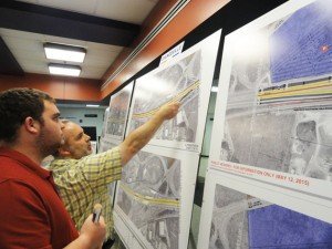 Residents review VDOT maps of I-66 road expansion. 