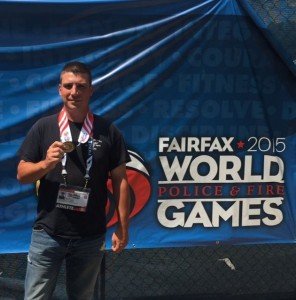Officer Justin Bonner with his gold medal at the 2015 Fairfax World Fire & Police Games. 