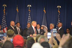 Trump invites several African American pastors and ministers on stage with him. 
