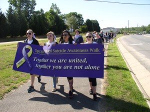 Students and community members walk for suicide awareness last year. 
