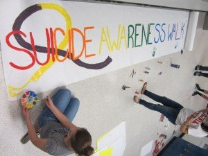 Forest Park seniors work on a banner for this Saturday's Suicide Awareness walk.