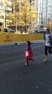Lily racing ahead of her mother who was holding her oxygen tank during last year's 5K race. 