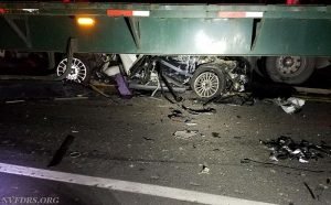 Photo of car underneath truck on Route 28 in Nokesville