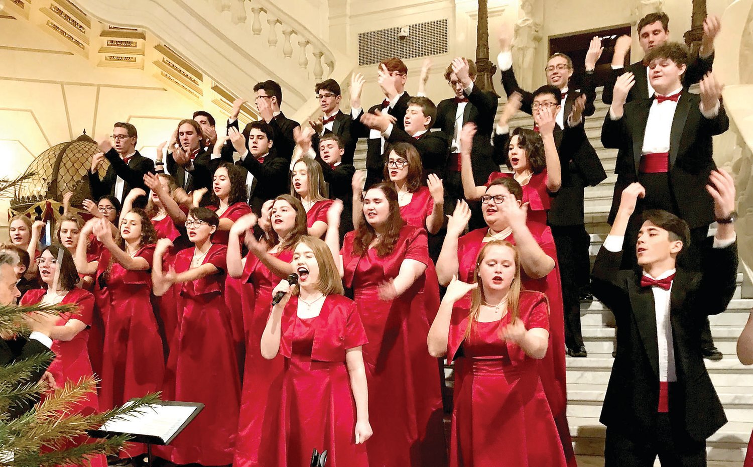 The Quakertown Community High School Varsity Singers perform at the annual Capitol Tree Lighting.