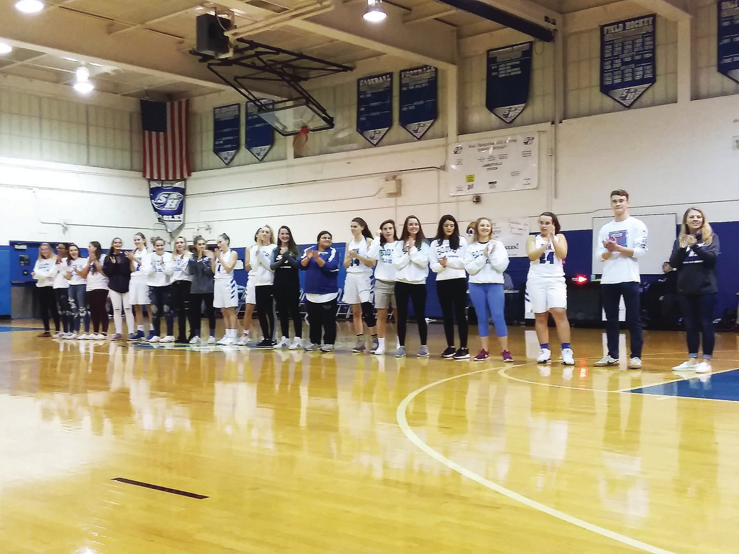 South Hunterdon diver Lance Christopher and the 2018 field hockey team were recognized during a banner ceremony on Dec. 21. Christopher, a senior, was named an All-American diver and was second in the state last year. The field hockey team went 8-5-1 (5-0-1 in conference) and won the Skyland Mountain conference title.  Photograph by Don Leypoldt.