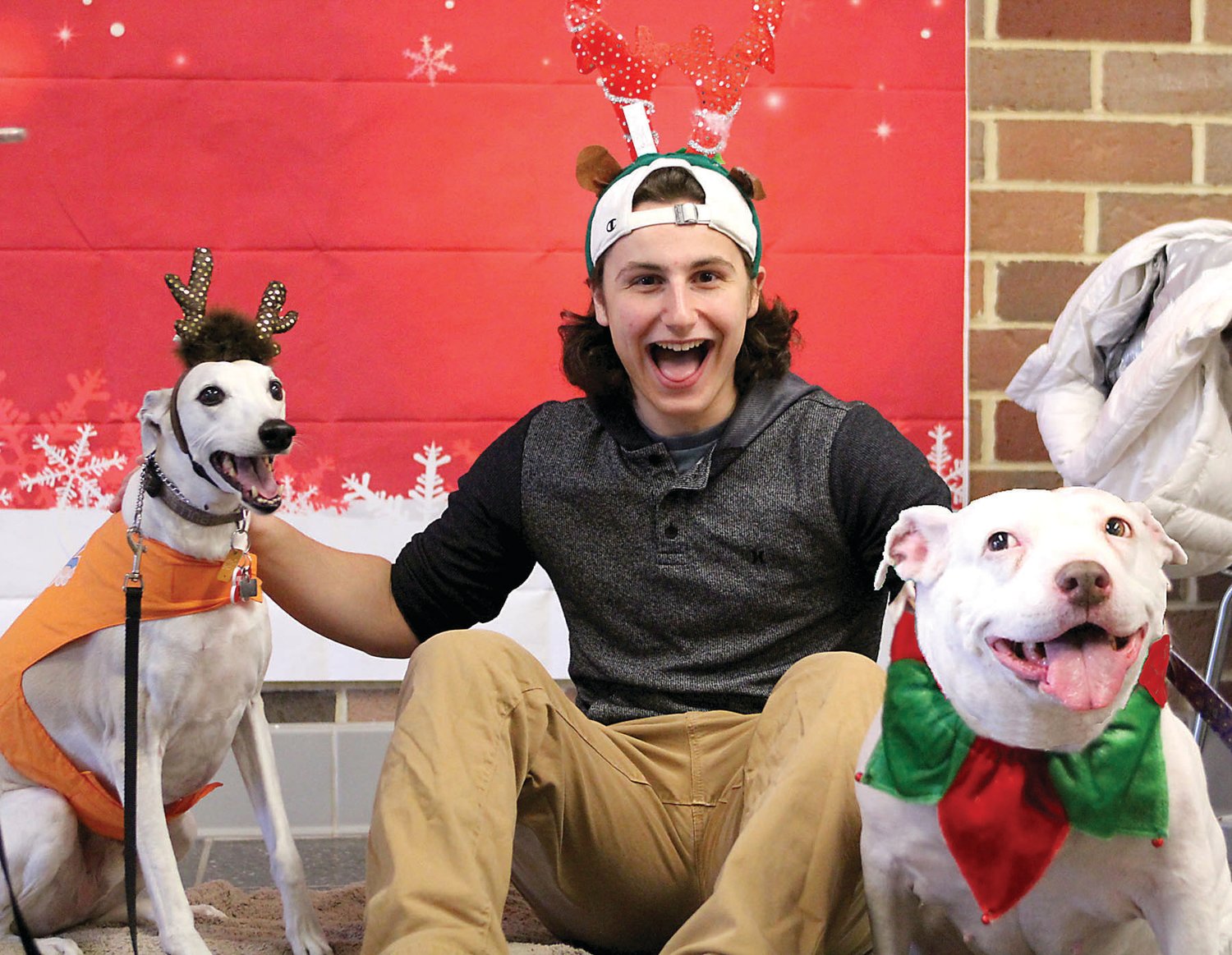 Bullet and Mo have fun with a CB East student.  Photograph by Taylor Maney.