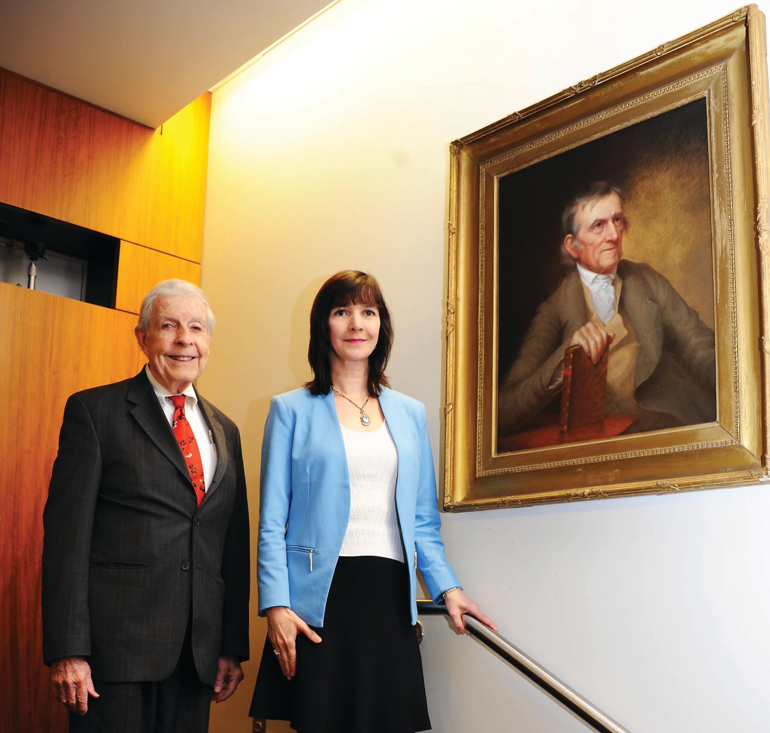 Frank Gallagher and Grace Deon stand next to Judge Henry Wynkoop’s portrait