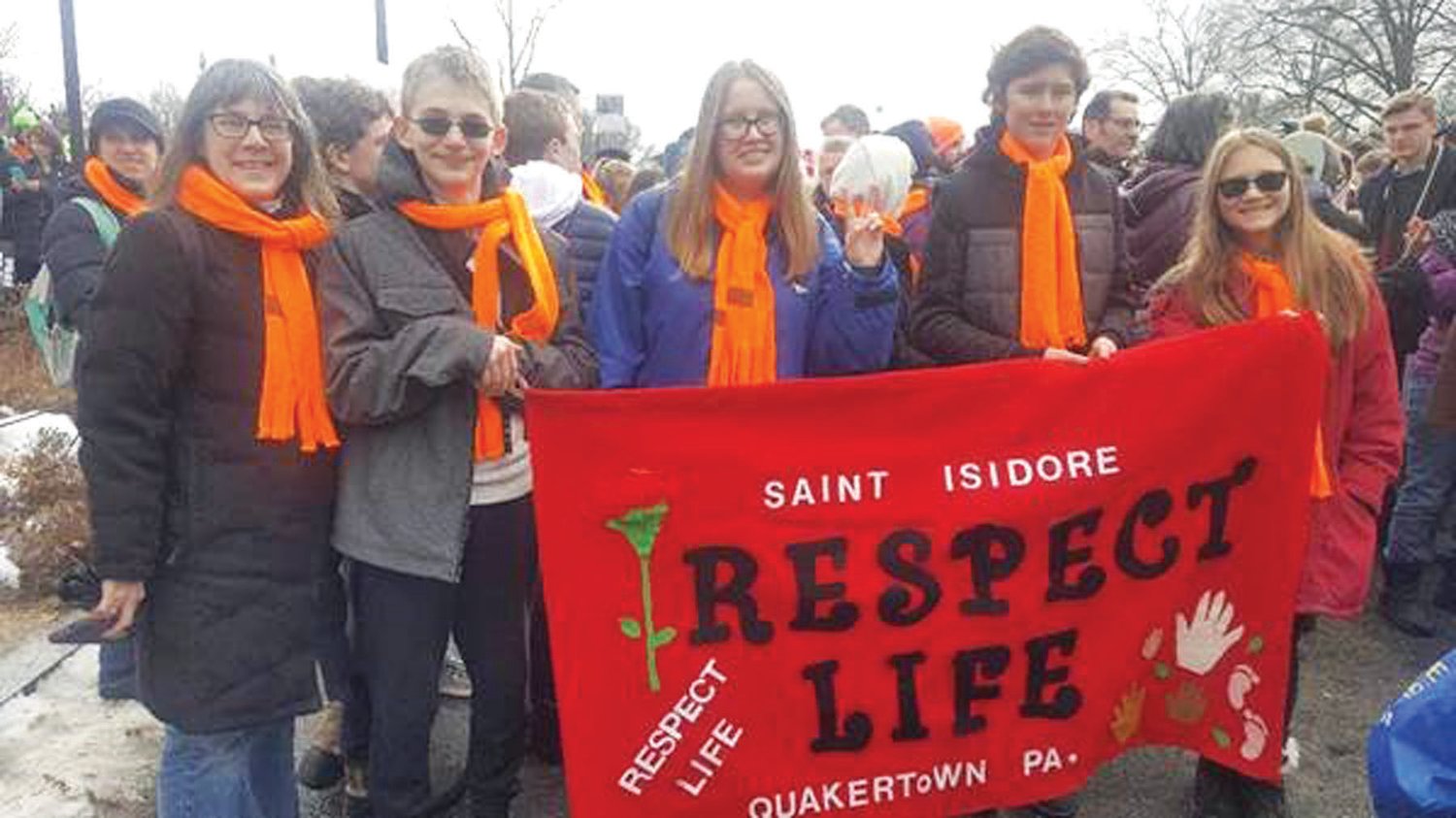 Above: Students from St. Isidore in Quakertown take part in the recent March for Life in Washington, D.C. Below: Marchers gather outside the U.S. Supreme Court.