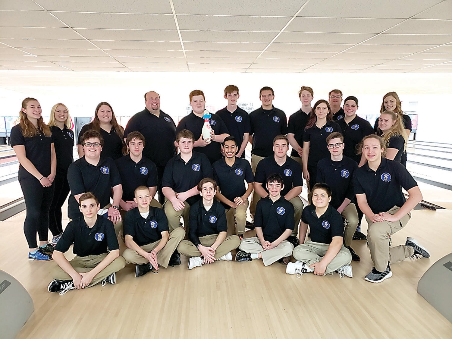 Quakertown’s bowlers pose for a group photograph. The boys team is currently in third place in the Suburban One League American Conference.