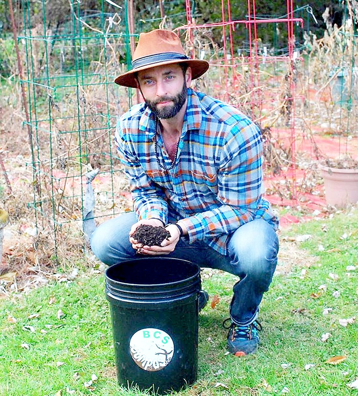 BCS Compost Founder Brian Schneider shows how waste can be recycled into nutrient soil for gardens.