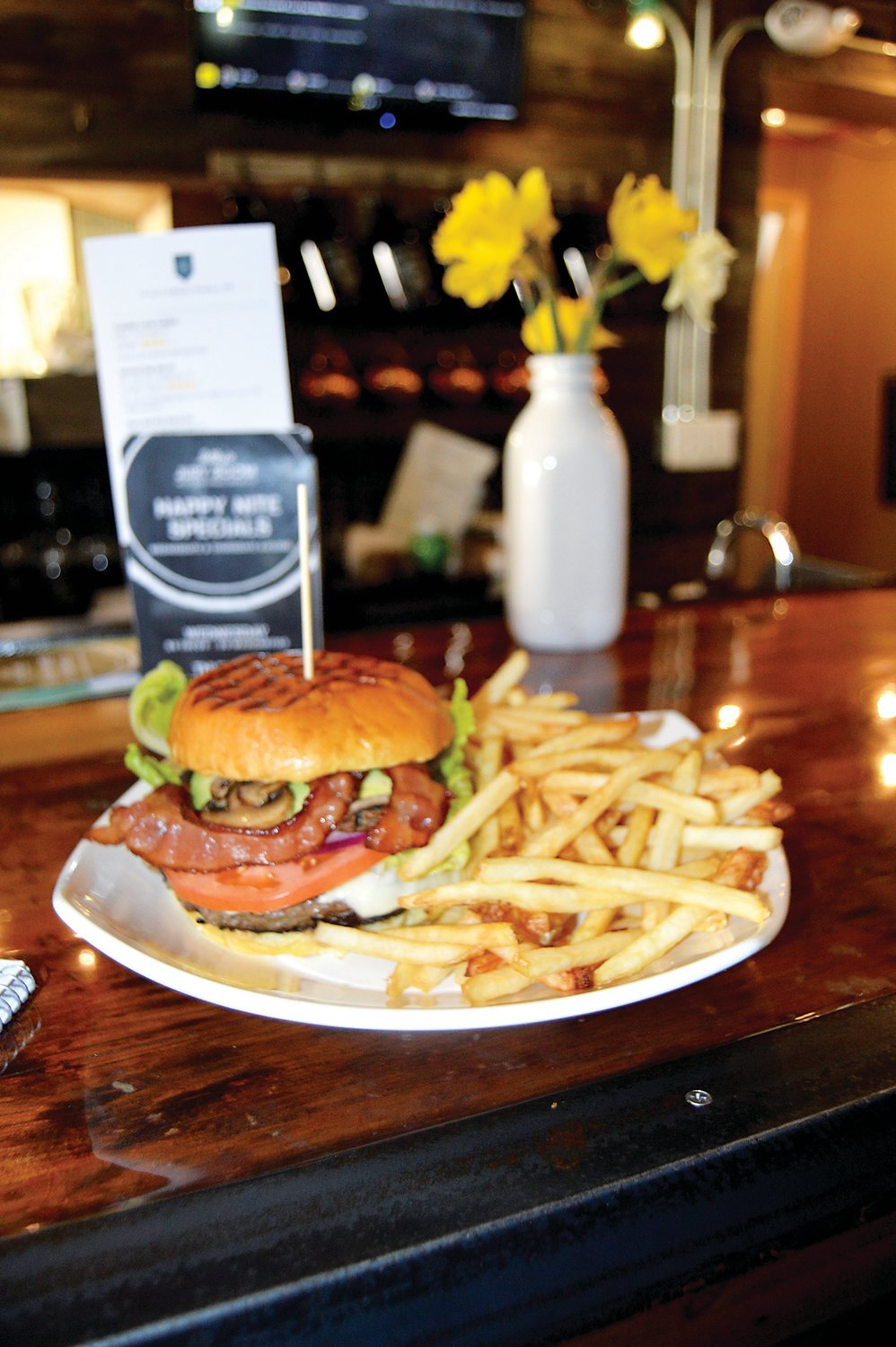 Burgers are among the top sellers at the Jury Room, a small restaurant and boutique brewery in the heart of Doylestown. Photograph by Susan S. Yeske.