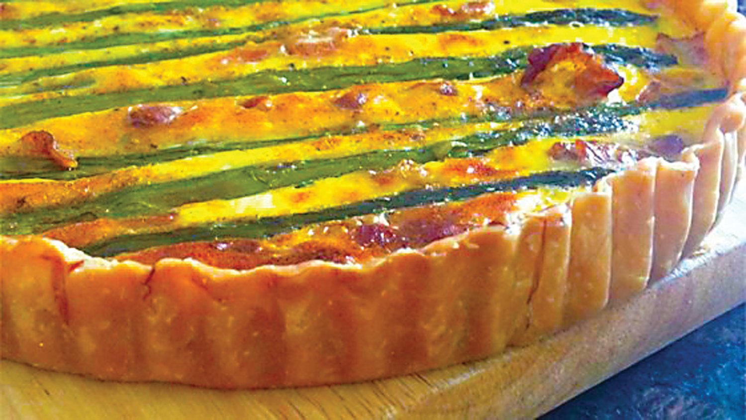 Asparagus and eggs are favorites at Easter and they come together in this simple quiche that would work for any brunch or buffet. Photograph from allrecipes.com.