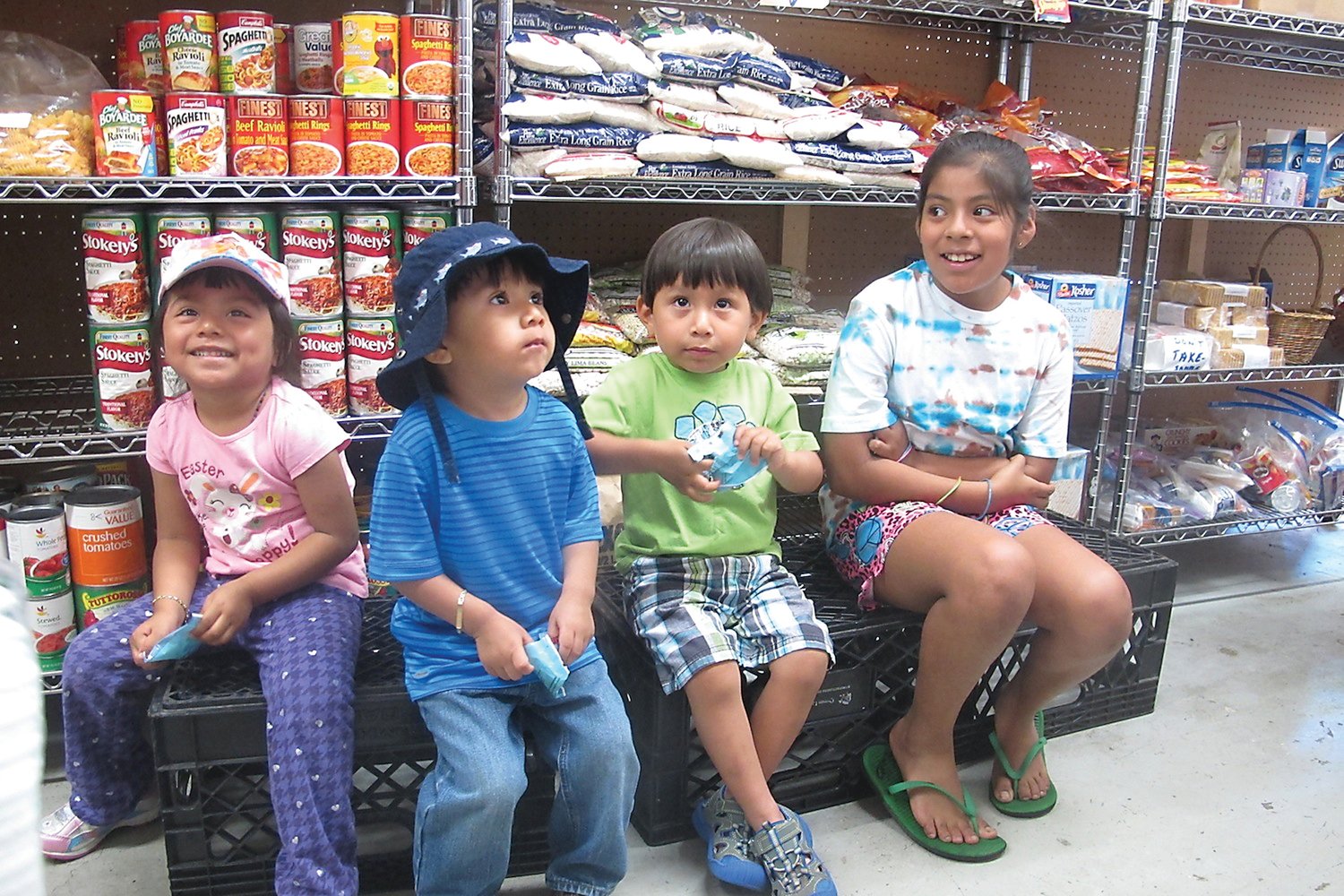 Youngsters wait while their mothers shop at the Delaware Valley Food Pantry, formerly the Lambertville Food Pantry.