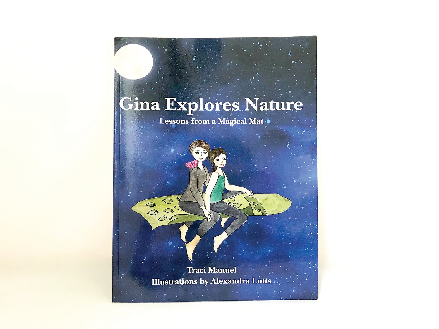 The cover of “Gina Explores Nature: Lessons from a Magical Mat,” written by Traci Manuel and illustrated by Alexandra Lotts.