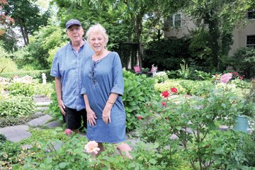 Jim and Helen Aldredge invited tour walkers into their garden. Photograph by Carol Ross.