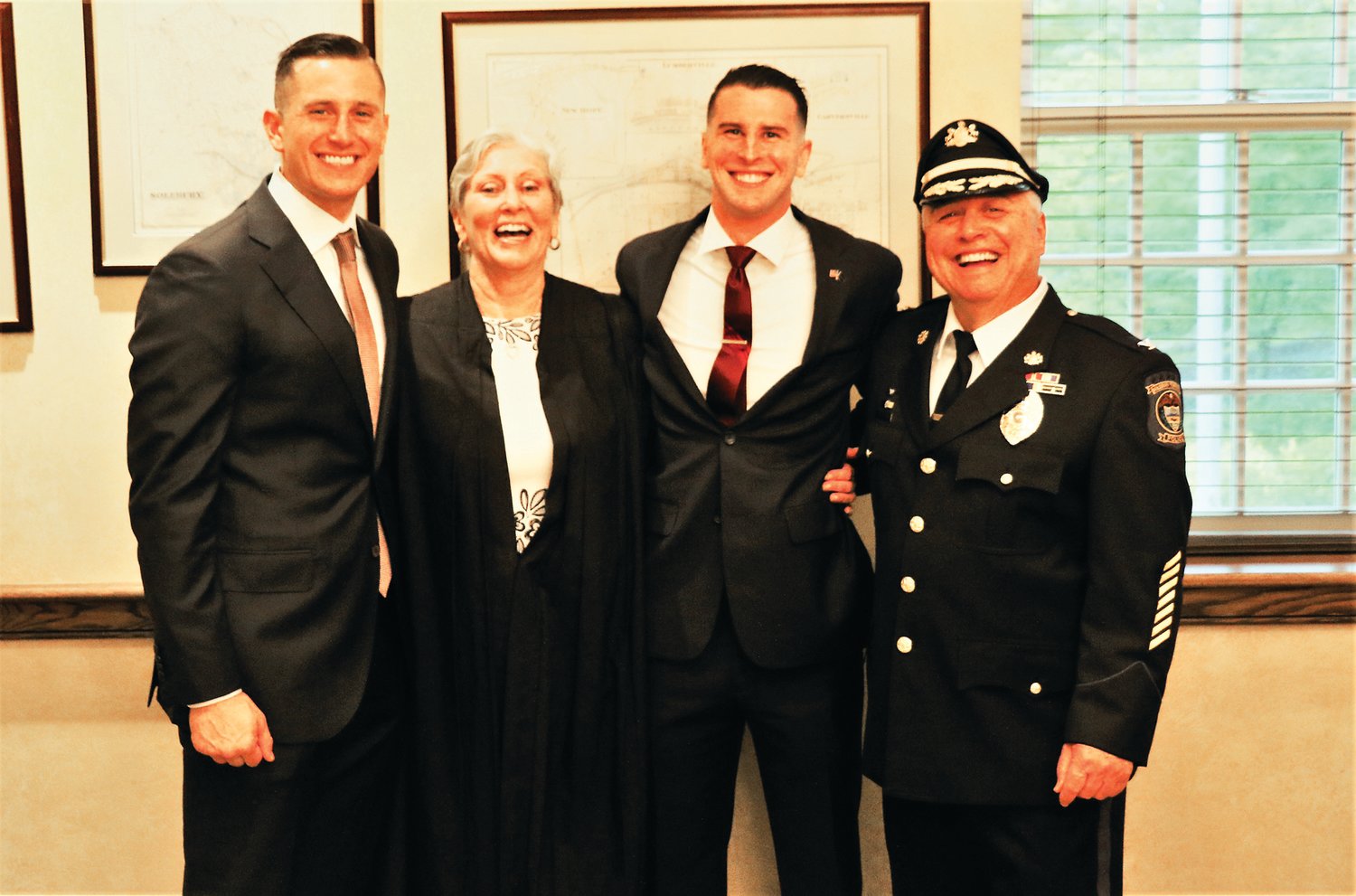 From left are Patrick Dorsey, district Judge Jean Seaman (covering for Judge Maggie Snow) Brendan Murphy and Chief Dominick P. Bellizzie.