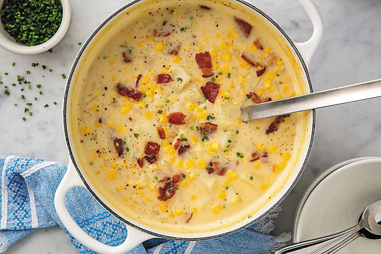 Corn chowder is an easy weeknight meal that takes advantage of the local sweet corn still in season. Photograph by Ethan Calabrese/Delish.com.