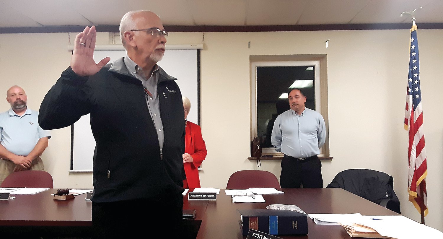 Supervisor Jim Hopkins is sworn in last week. Hopkins, who brings 14 years’ experience to the job, will serve out the remainder of former Supervisor Dave Long’s term. Most recently, he led the 2019 Community Day Committee. Photograph by Barrie-John Murphy.