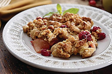 Cranberry Apple Crisp is one way to use traditional cranberries at Thanksgiving and any time you need an easy dessert.  Photograph by Oceanspray.com.
