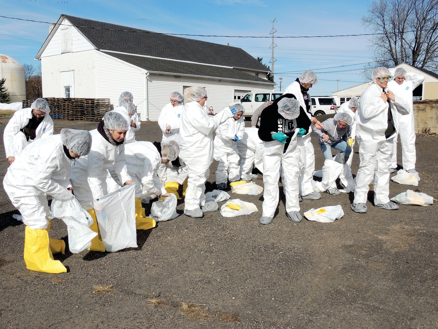Delaware Valley University students don protective clothing to prepare for a mock disease outbreak exercise. Photograph by Delaware Valley University.
