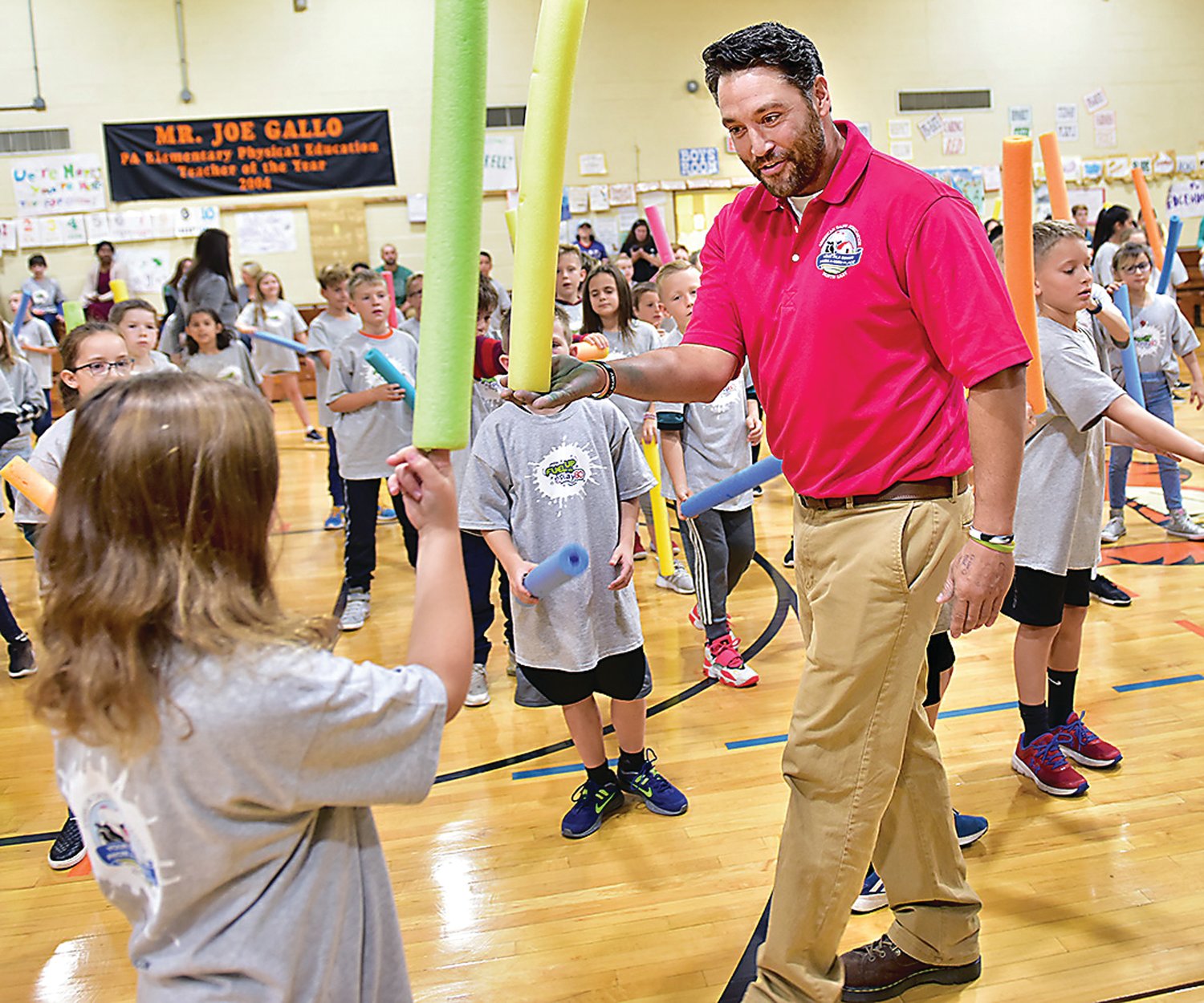 Dairy farmer Jimmy Harris of Holly Brooks Farm in Perkasie participates in a Fuel Up to Play 60 program kickoff at Edgewood Elementary School, Yardley, Oct. 15.