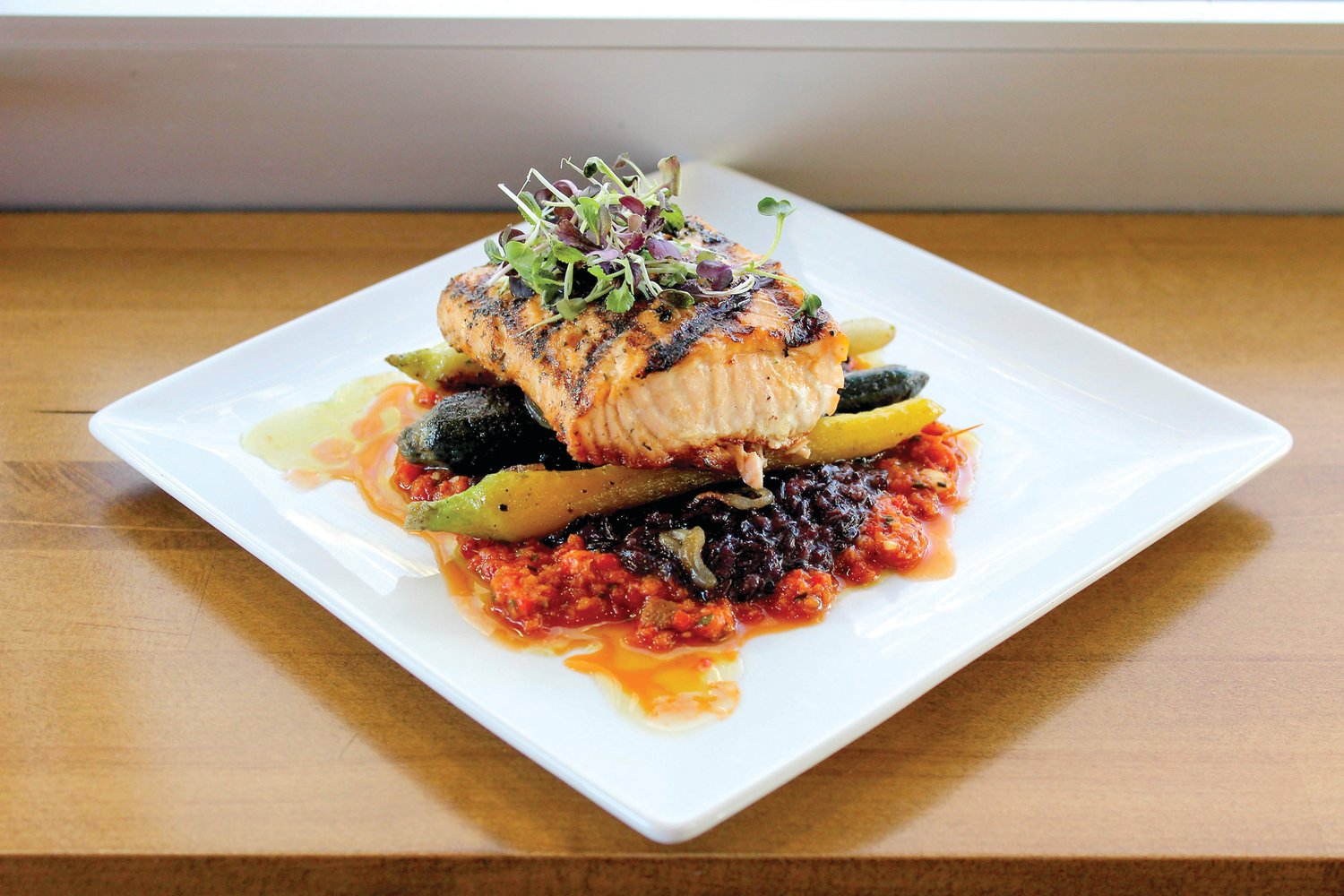 Salmon is a regular item on the menu at The Deck Restaurant and Bar in New Hope, located on the upper deck of the Bucks County Playhouse. Photograph courtesy of The Deck Restaurant and Bar