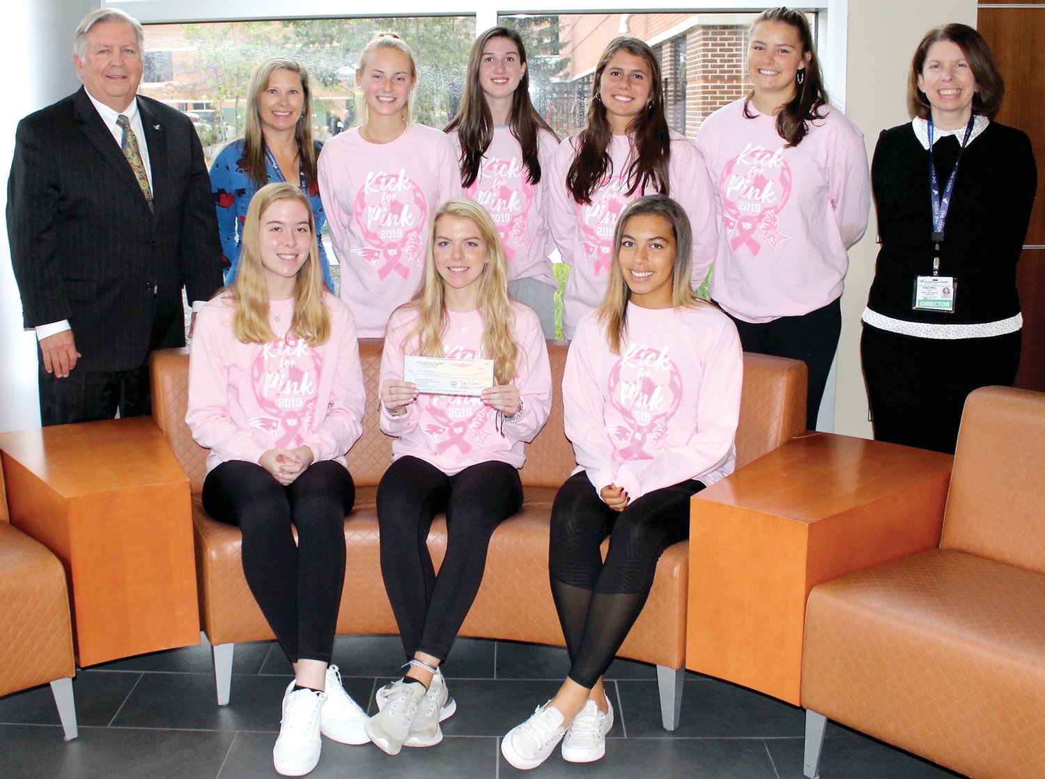 From left are: Front row: Erin Fitzsimmons, Ryan Fitzsimmons, Morgan Dorsey; back row, Doylestown Health President and CEO Jim Brexler; Amy Kyriakos, Oncology Services coordinator; Olivia Black, Tori Albrecht, Anna Valko, Marissa Plack and Rachel Saks, director of the Cancer Institute.. Not pictured: Jenna Abaza.