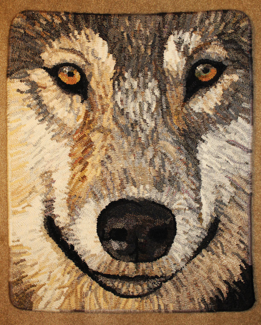 “Wolf Close Up” is by Judy Carter.