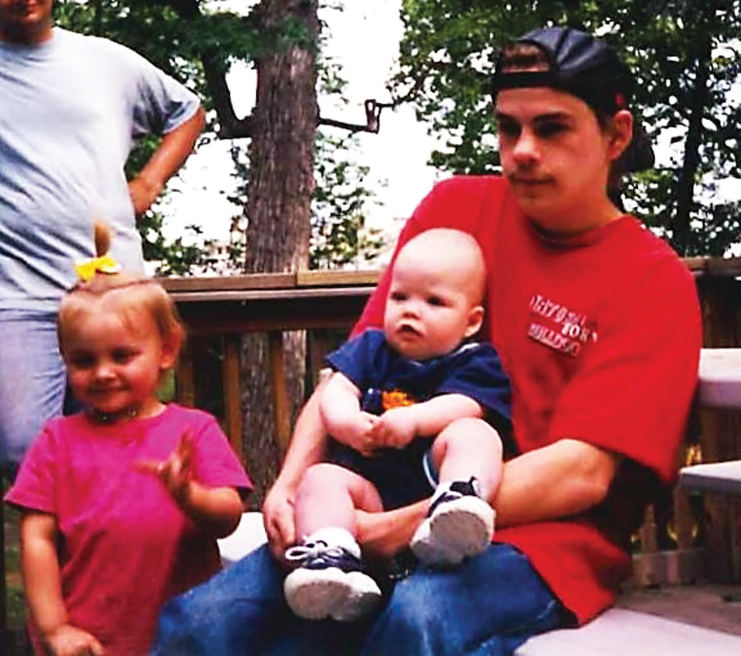 Adam Brundage with his two children. Photograph courtesy of the Bucks County District Attorney's Office