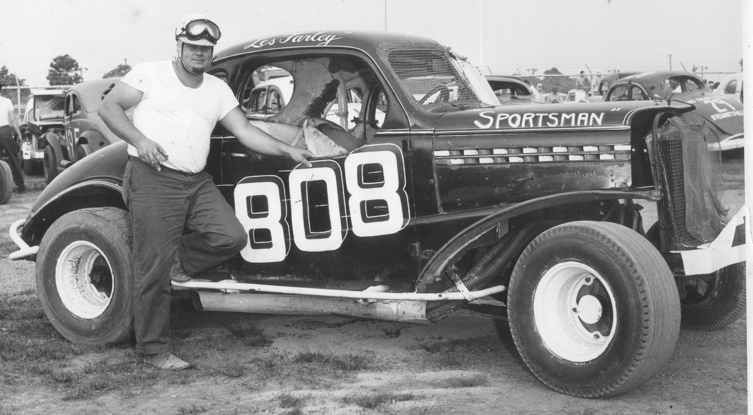 Driver Les Farley with his car, number 808.
