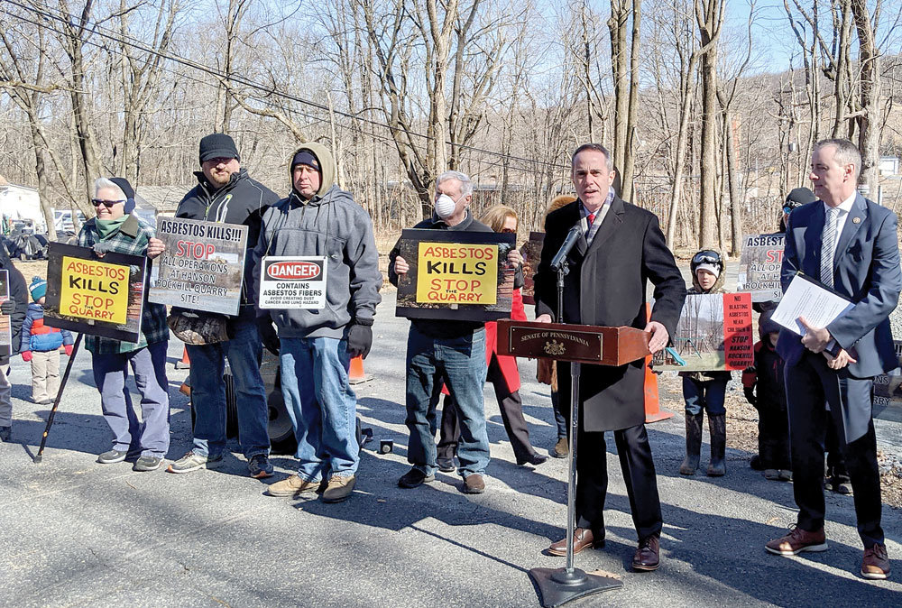 State Sen. Steve Santarsiero addresses the crowd at a press conference outside the Rockhill Quarry Friday morning. Congressman Brian Fitzpatrick is on the right. Photograph by Joe Ferry.