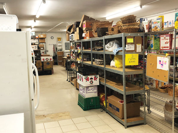 Shelves inside the Delaware Valley Food Pantry hold its remaining shelf-stable goods. The pantry, which is closing temporarily due to the threat of COVID-19,  is seeking monetary donations so it can provide gift cards to area supermarkets to clients who include families and seniors in need until the pantry re-opens.