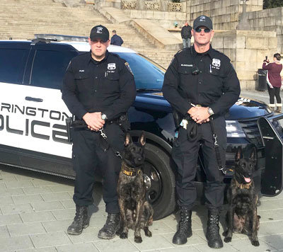 At their graduation in 2018 from PennVet Working Dog Center are, from left, Officer Stephen Plum, K9 Murphy, Officer John Blanchard and K9 Jolie.