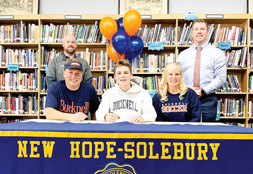 New Hope-Solebury student MJ Kuczura has committed to play soccer at Bucknell. He was joined at a letter signing held earlier this year by his parents, Mike and Susan Kuczura, seated next to their son, and, from left, standing, Assistant Director of Athleticsm Kris Foulk and Director of Athletics Erik Pedersen.