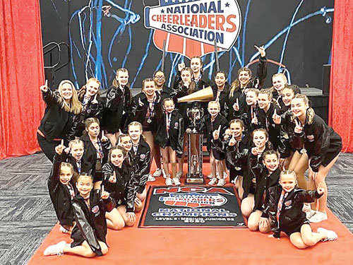 Bulletproof, the Airborne Elite All-Star Cheerleaders of Warmisnter Junior Level 2 team, won gold at the NCA All-Star National Championship.