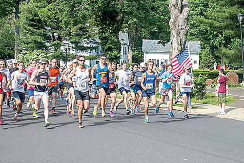 Runners participate in a previous Bucks 5K Series race. The series, which was canceled this year due to the coronavirus pandemic, returns in 2021.