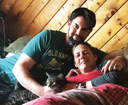 Richard and Shannon Leary with their cat, Callie.