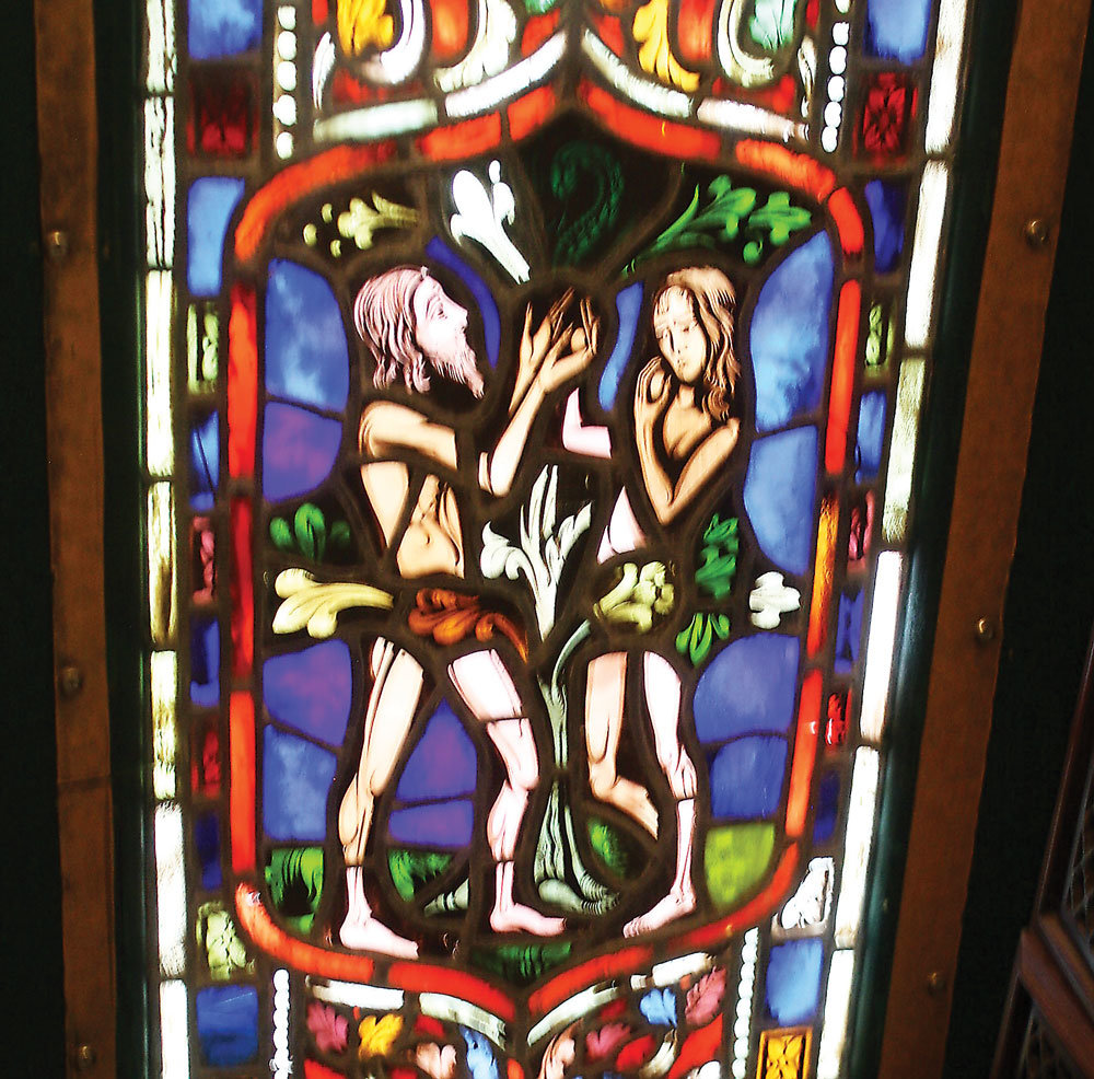 Adam and Eve panel is a detail of the stained glass doors on a Kintnersville antique shop.