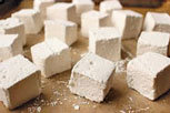 Marshmallows for your hot cocoa can be made at home and taste better than those mass-produced and sold in stores. (Delish.com photo)